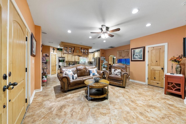 living room featuring ceiling fan