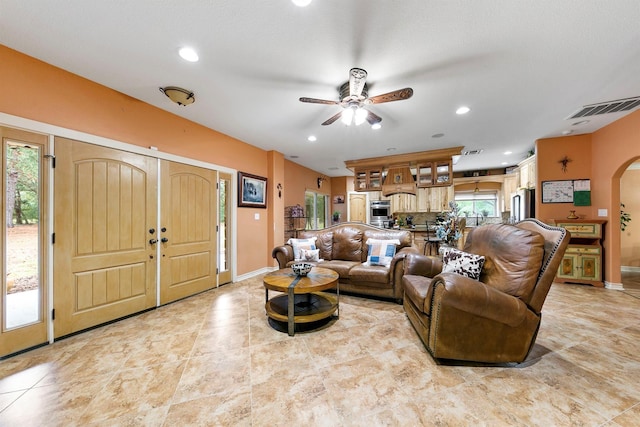 living room with ceiling fan