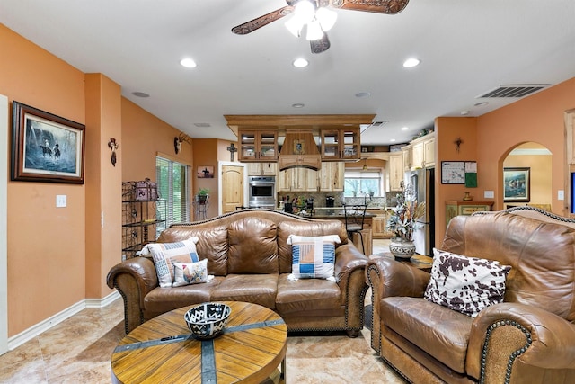 living room with ceiling fan