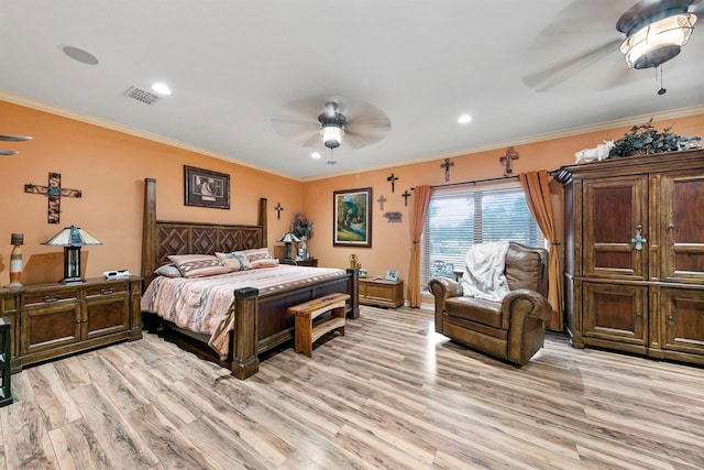 bedroom featuring ornamental molding, ceiling fan, and light hardwood / wood-style flooring