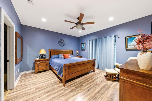 bedroom featuring ceiling fan and light hardwood / wood-style floors