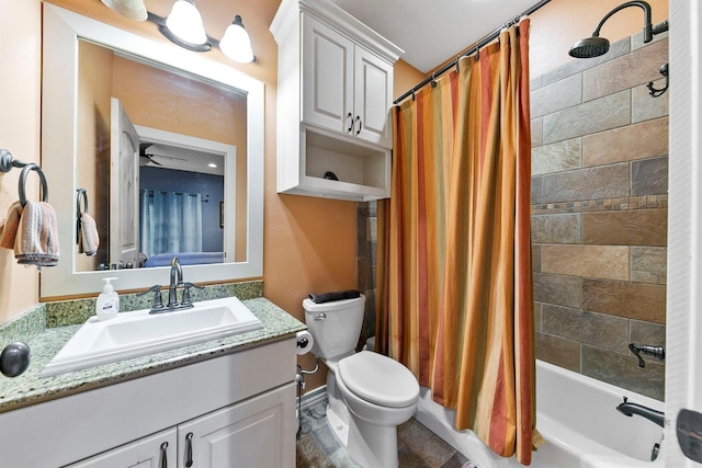 full bathroom with vanity, shower / bath combination with curtain, ceiling fan, and toilet