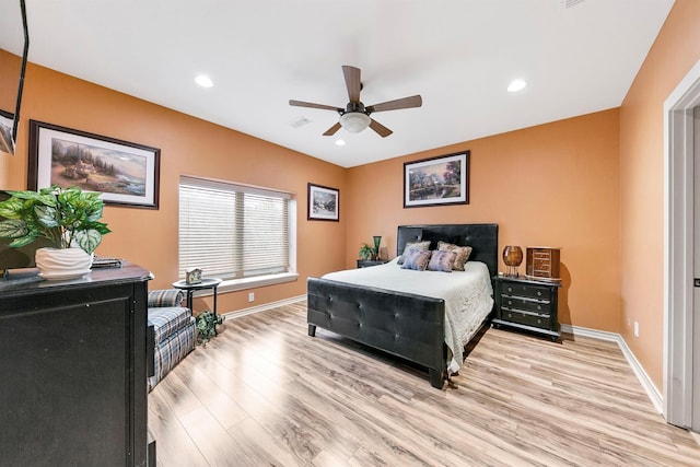 bedroom featuring ceiling fan and light wood-type flooring