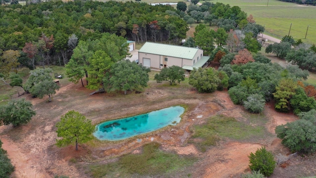 birds eye view of property featuring a rural view