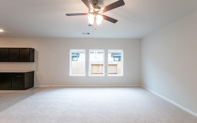 13301 Villa Sola Dr, La Marque, TX 77568 - unfurnished living room with light colored carpet and ceiling fan