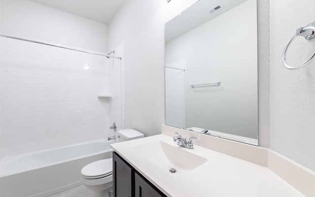 13301 Villa Sola Dr, La Marque, TX 77568 - full bathroom featuring vanity, tiled shower / bath combo, and toilet