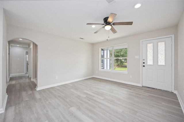 entryway with ceiling fan and light wood-type flooring