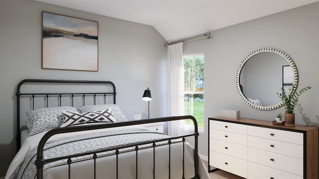 bedroom with lofted ceiling