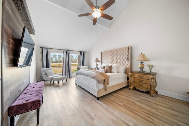 bedroom with beam ceiling, ceiling fan, high vaulted ceiling, and light hardwood / wood-style floors