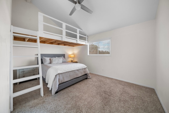 bedroom with carpet floors and vaulted ceiling