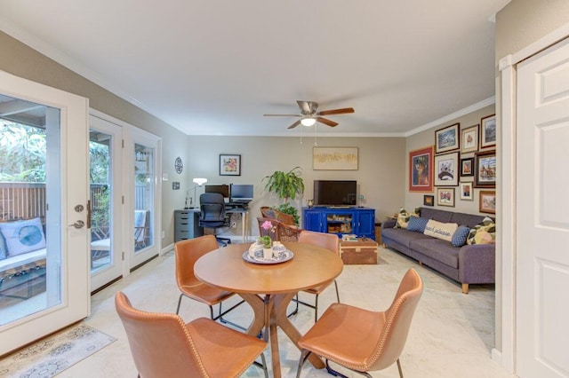 dining space featuring french doors, ceiling fan, and ornamental molding