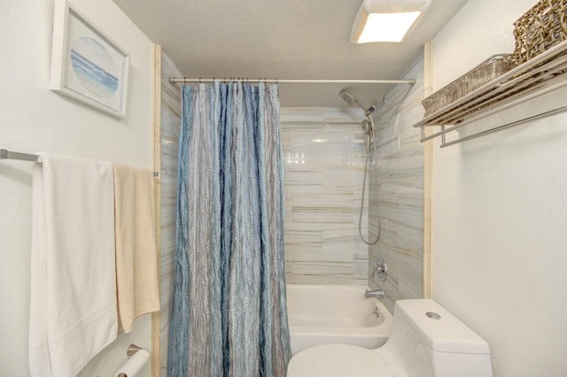 bathroom featuring a textured ceiling, toilet, and shower / bath combo with shower curtain