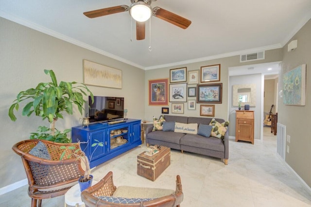 living room featuring ornamental molding and ceiling fan