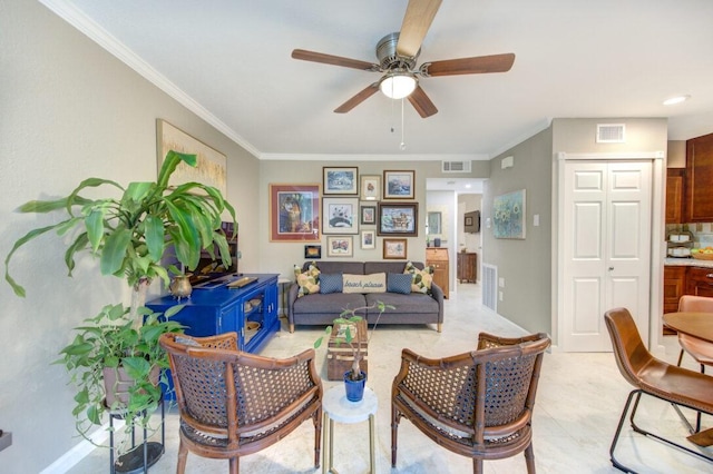 interior space featuring ceiling fan and ornamental molding