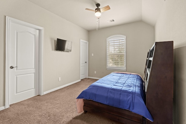 bedroom with light carpet, lofted ceiling, and ceiling fan