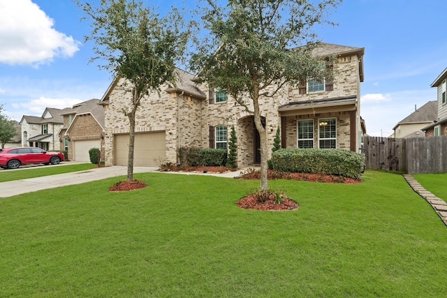 view of front of property with a garage and a front yard