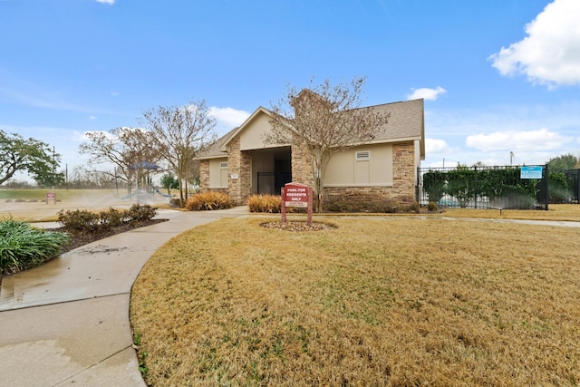 view of front of property with a front lawn