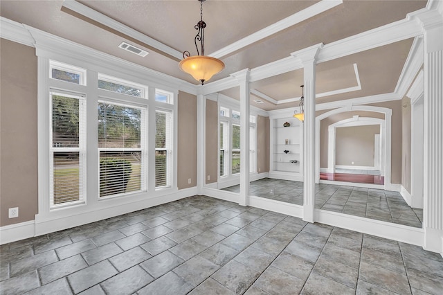 unfurnished sunroom with a raised ceiling