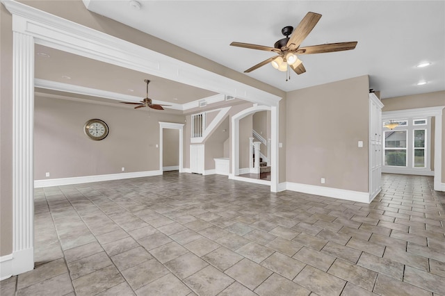 unfurnished living room with light tile patterned floors and ceiling fan