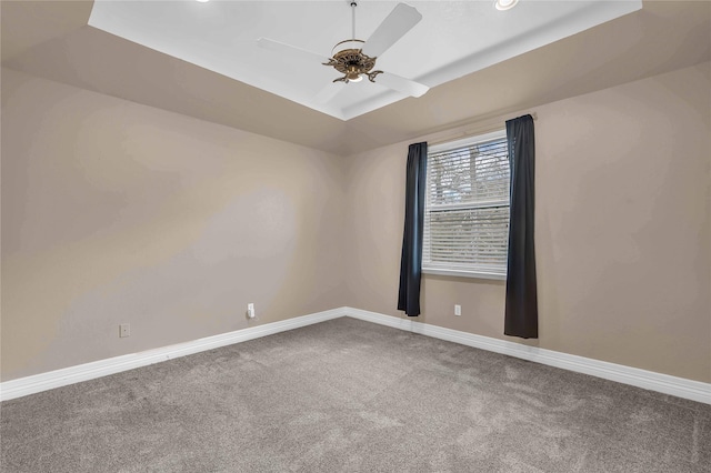 unfurnished room with ceiling fan and carpet floors