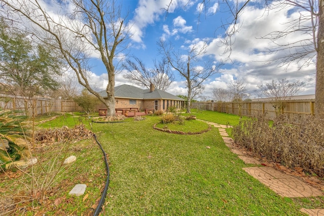 view of yard featuring a deck