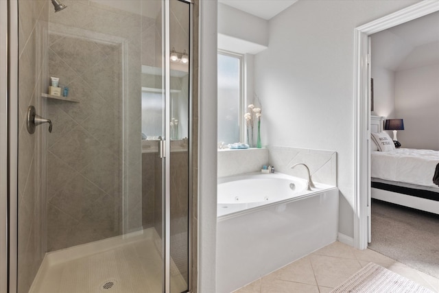 bathroom featuring independent shower and bath and tile patterned floors