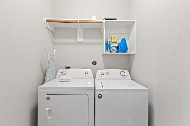 washroom featuring independent washer and dryer