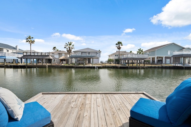 dock area with a water view