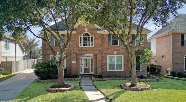 view of front of home with a front yard