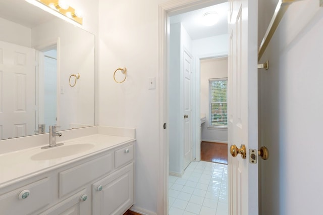 bathroom with vanity and tile patterned flooring