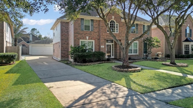 view of front facade with a garage and a front lawn