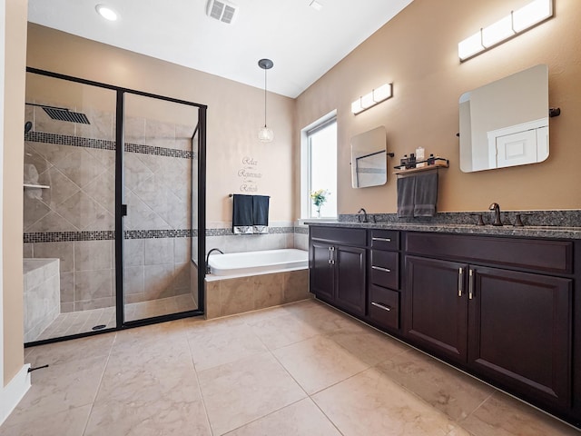 bathroom with vanity and plus walk in shower