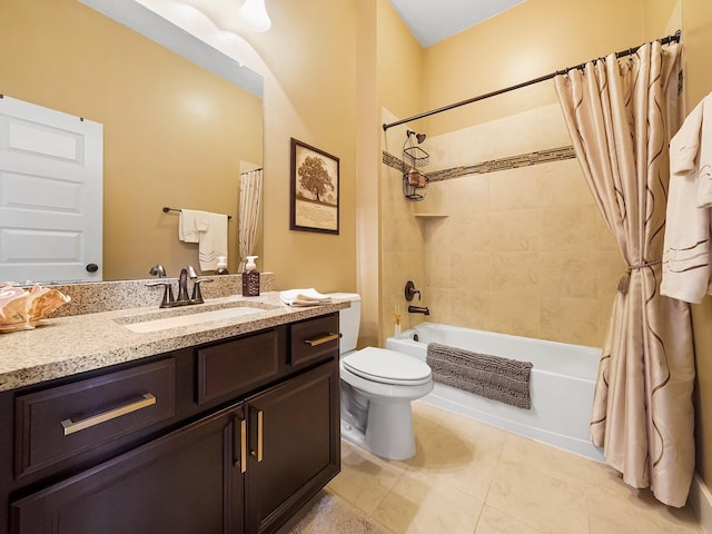 full bathroom with shower / tub combo, vanity, tile patterned floors, and toilet