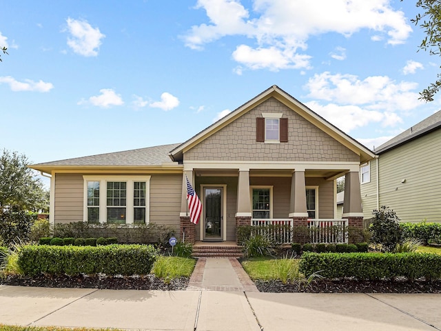 craftsman-style home featuring covered porch