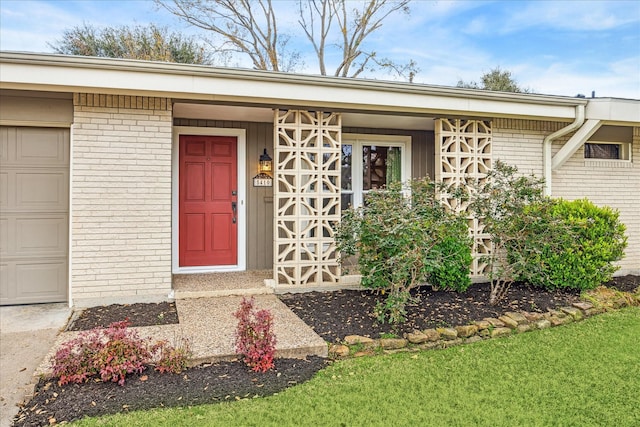 property entrance with a garage