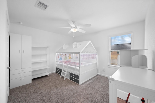 carpeted bedroom with ceiling fan