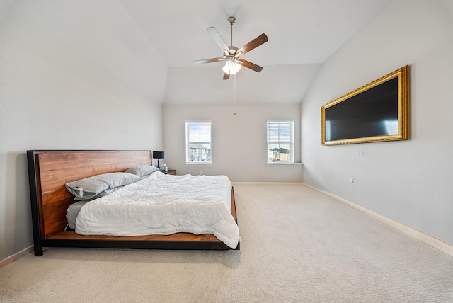 carpeted bedroom featuring ceiling fan and lofted ceiling