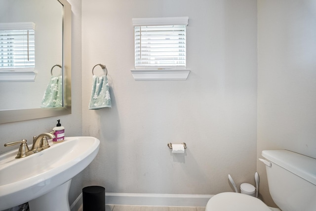 bathroom with toilet and sink