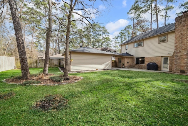 view of yard with a patio area and fence