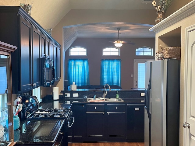 kitchen featuring sink, vaulted ceiling, dark hardwood / wood-style flooring, ceiling fan, and black appliances