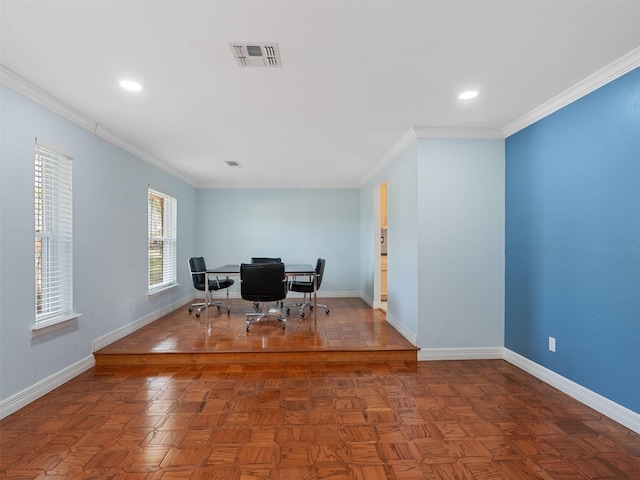 office space with dark parquet flooring and ornamental molding