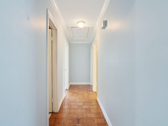 hallway with light parquet floors and ornamental molding