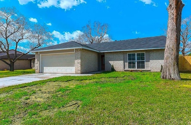 single story home with a garage and a front yard