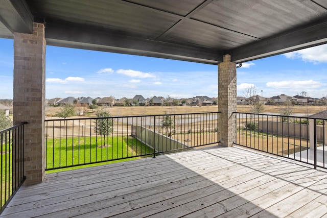 deck featuring a lawn