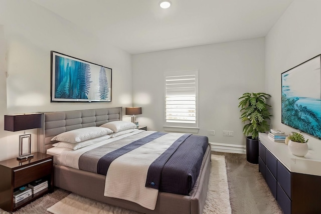 bedroom featuring dark colored carpet