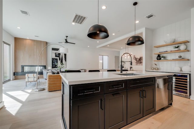 310 E 27th St, Houston, TX 77008 - kitchen with dishwasher, visible vents, wine cooler, and a sink
