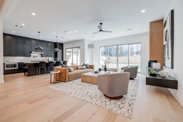 310 E 27th St, Houston, TX 77008 - living area featuring recessed lighting, a ceiling fan, visible vents, and light wood-style flooring