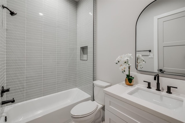 310 E 27th St, Houston, TX 77008 - bathroom featuring toilet, vanity, and shower / tub combination