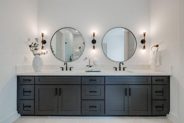 310 E 27th St, Houston, TX 77008 - full bath featuring baseboards, a sink, and double vanity