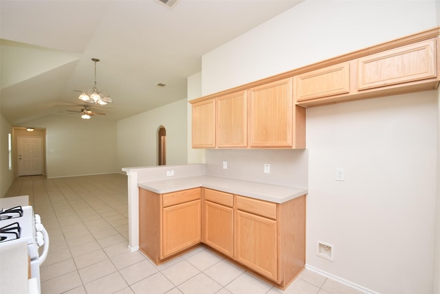 kitchen with white range with gas cooktop, light brown cabinetry, and ceiling fan